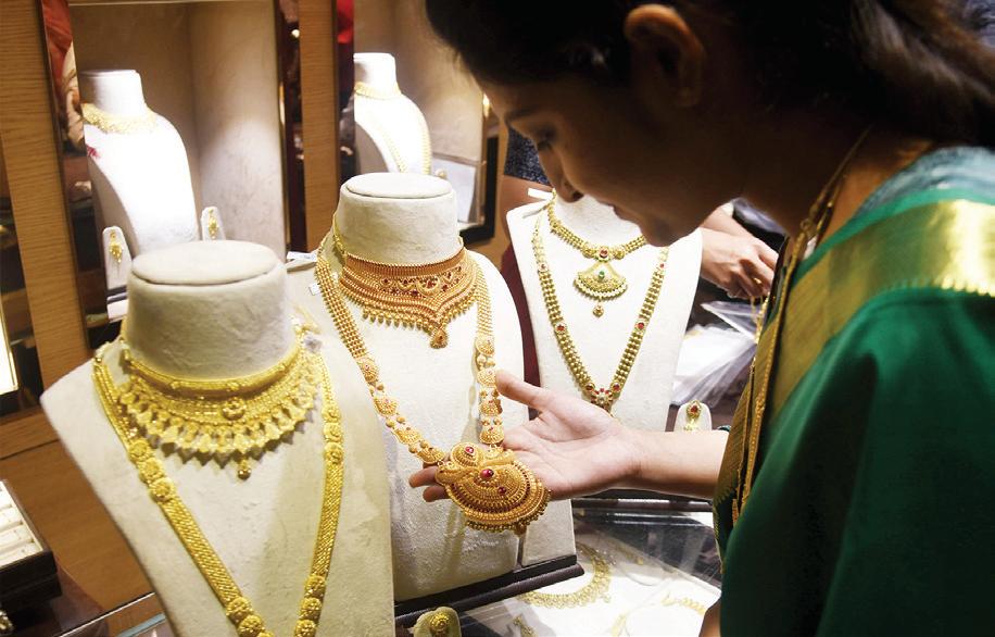 Gold prices likely to stay firm amid weak INR, global uptrend: Report