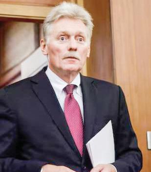 Kremlin spokesman Dmitry Peskov walks at Diaoyutai State Guesthouse