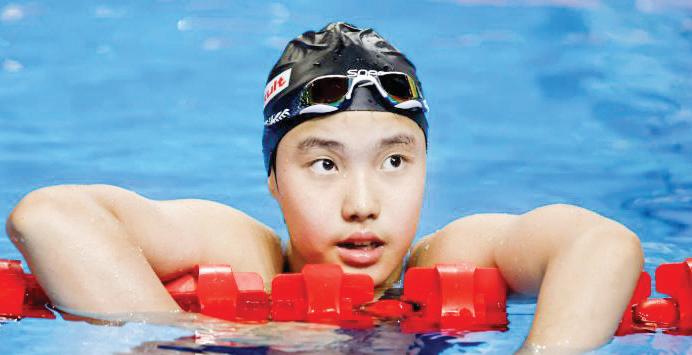 Swimming sensation Yu, 13, stuns again with Asian record