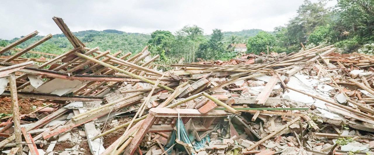 At least two killed, 21 missing after massive landslide in Indonesia