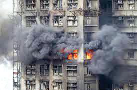 Death toll rises to 65 as Hong Kong firefighters battle burning towers