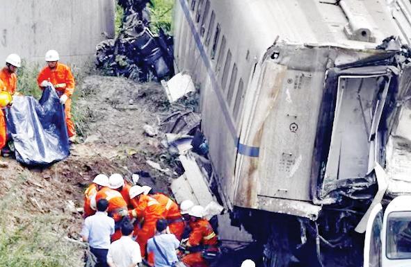 11 KILLED AS TEST TRAIN HITS TRACK WORKERS IN CHINA'S KUNMING