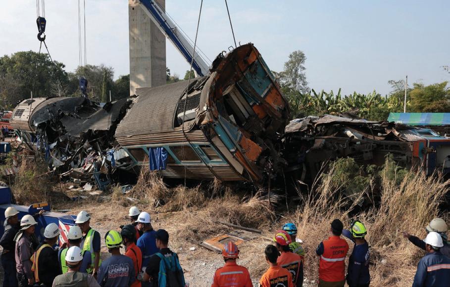 Crane collapse derails Thai passenger train, 32 killed