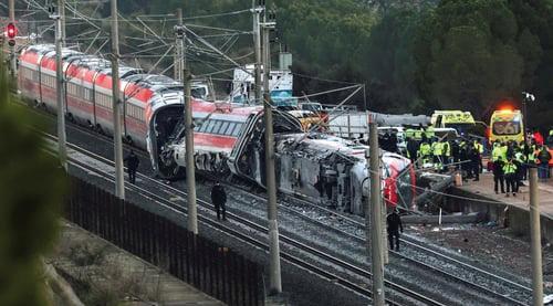DEATH TOLL IN SPANISH TRAIN COLLISION RISES TO 39