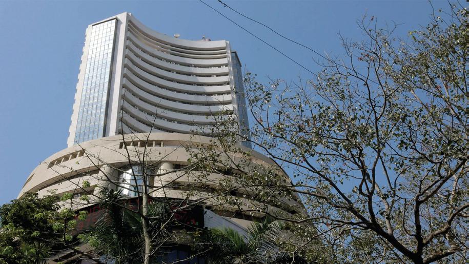 Markets end flat as RBI keeps rates unchanged