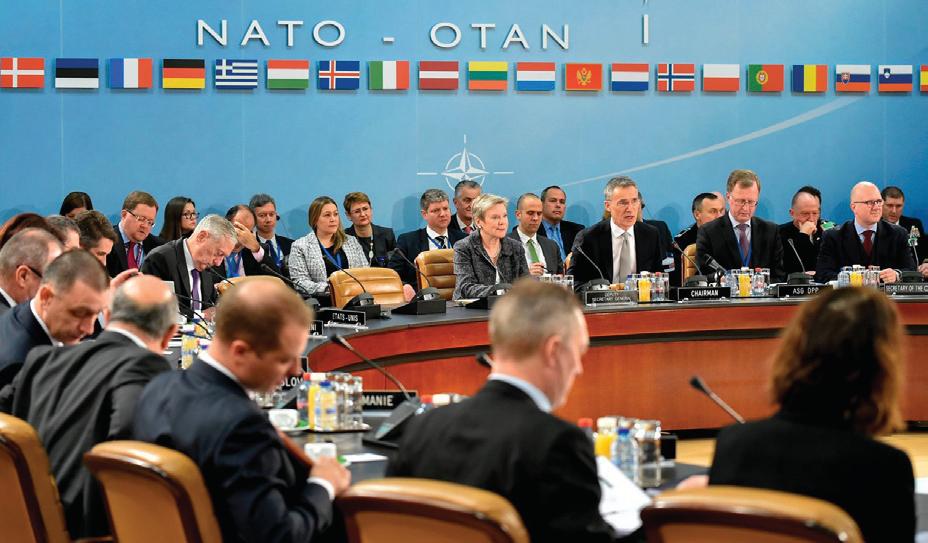 NATO allies brush off concerns over U.S. absence from key defense meeting