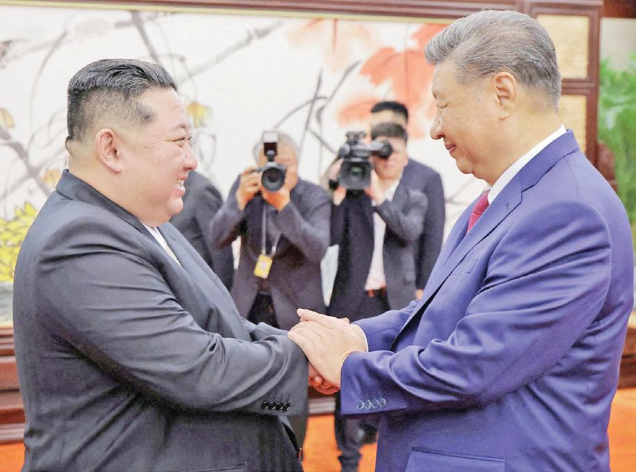 Xi arrives in North Korea in rare visit