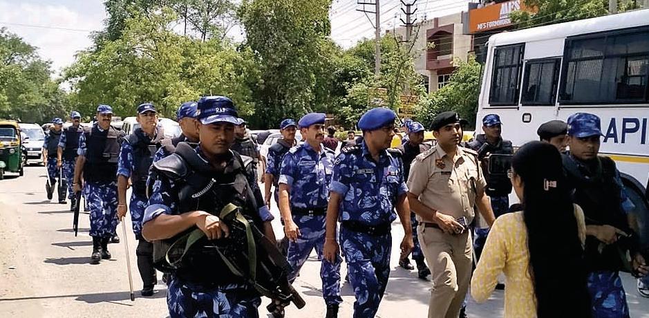 रैपिड एक्शन फोर्स के जवानों का जिला फरीदाबाद में परिचित अभ्यास, किया फ्लैग