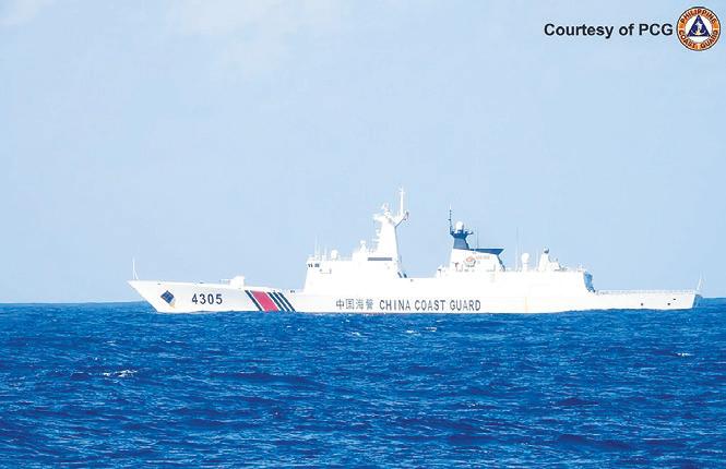 Philippine ship shadows Chinese vessels near Scarborough Shoal