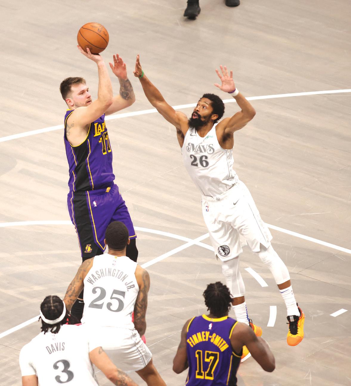 Tearful Doncic scores 45 on return to Dallas; Lakers grab playoff spot