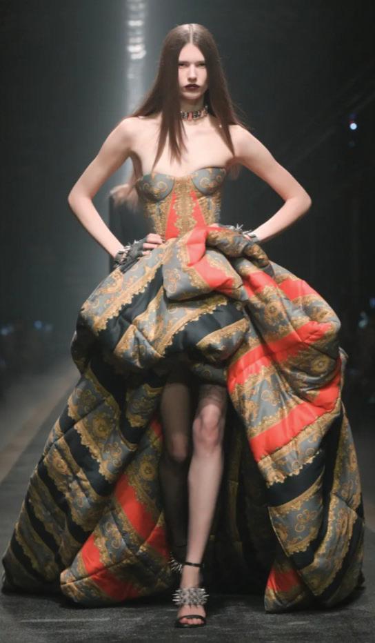 DONATELLA VERSACE GIVES UP CREATIVE REINS AND PRADA'S VERSACE ACQUISITION