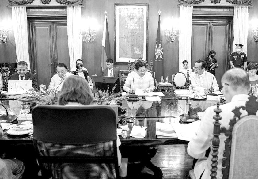 Safe from axe: Marcos' top economic minds staying on