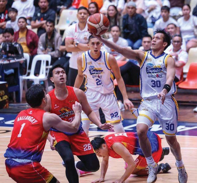 Hotshots hold off Fuel Masters, keep share of lead