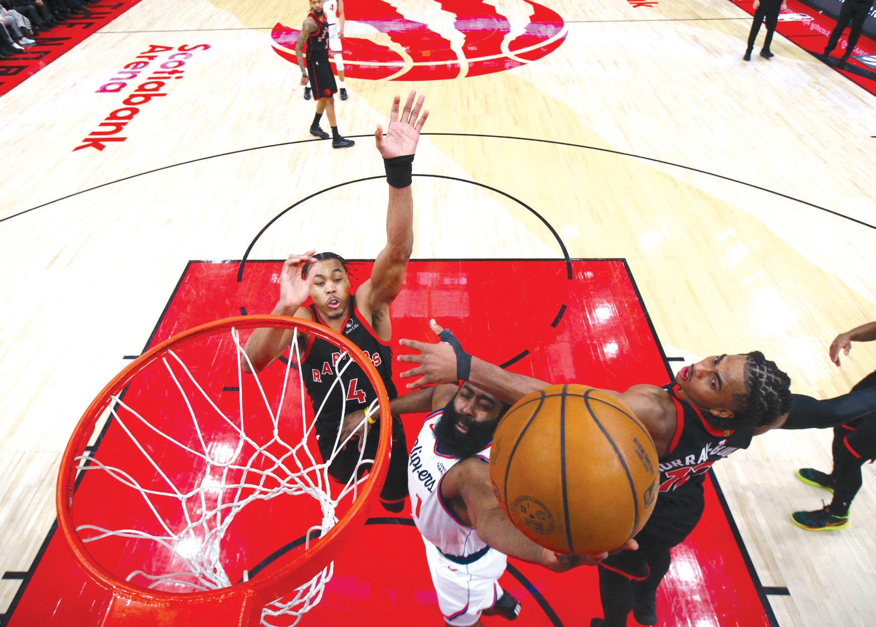 Harden steps up late as Clippers edge Raptors in OT
