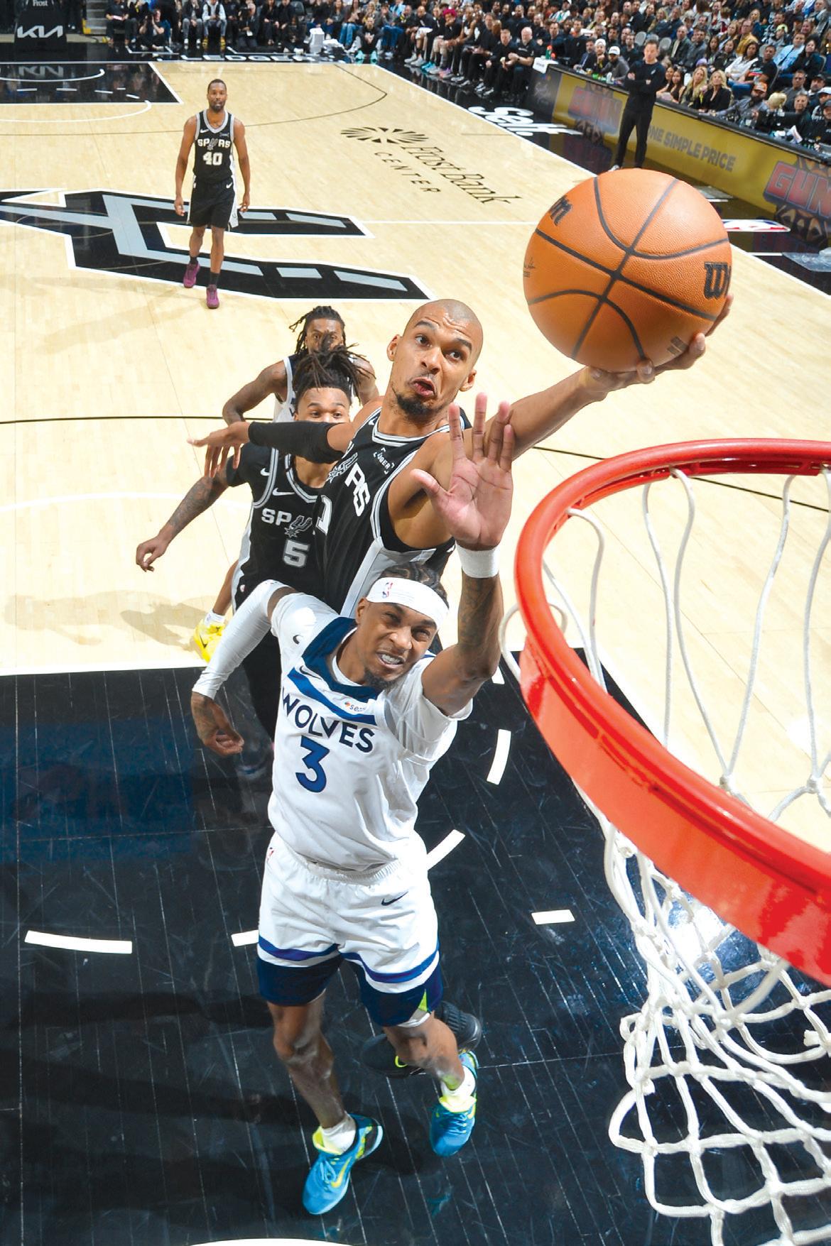 Spurs overcome Wolves in thriller
