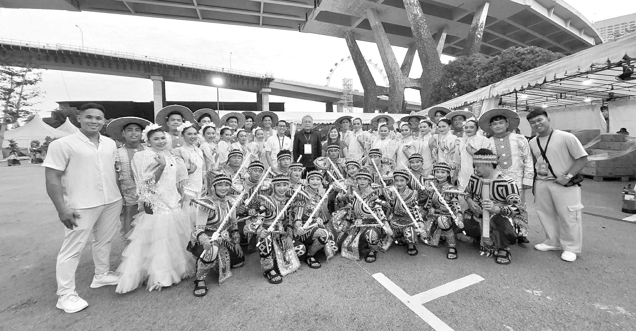 Performers earn praise in Singapore parade