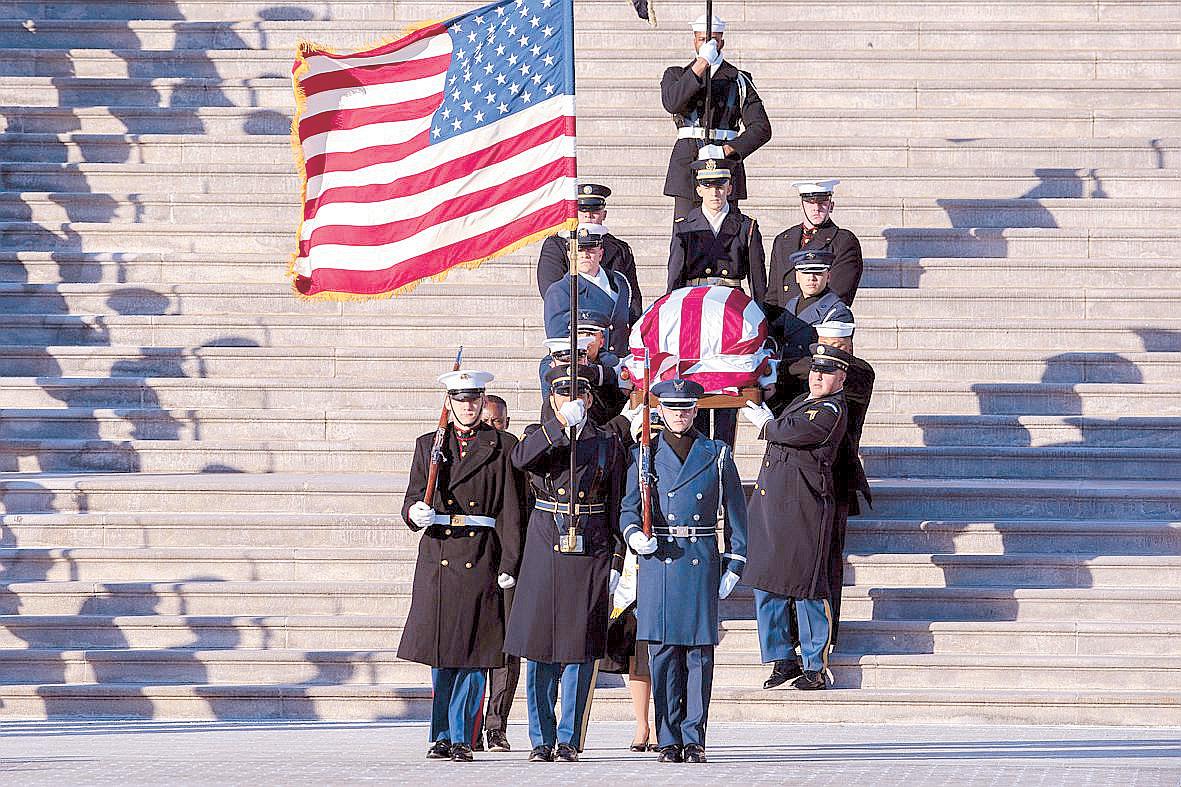 Jimmy Carter briefly unites US as presidents attend funeral
