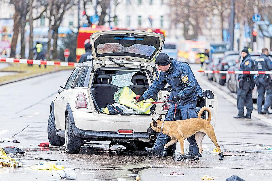 Driver plows into demonstrators in Munich, injuring 30