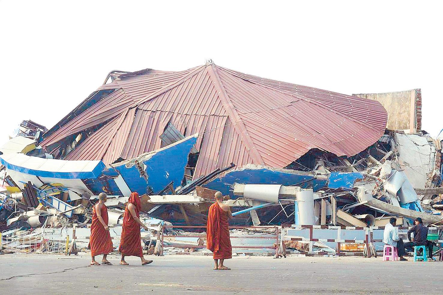 Tears in search for monks trapped in Myanmar quake