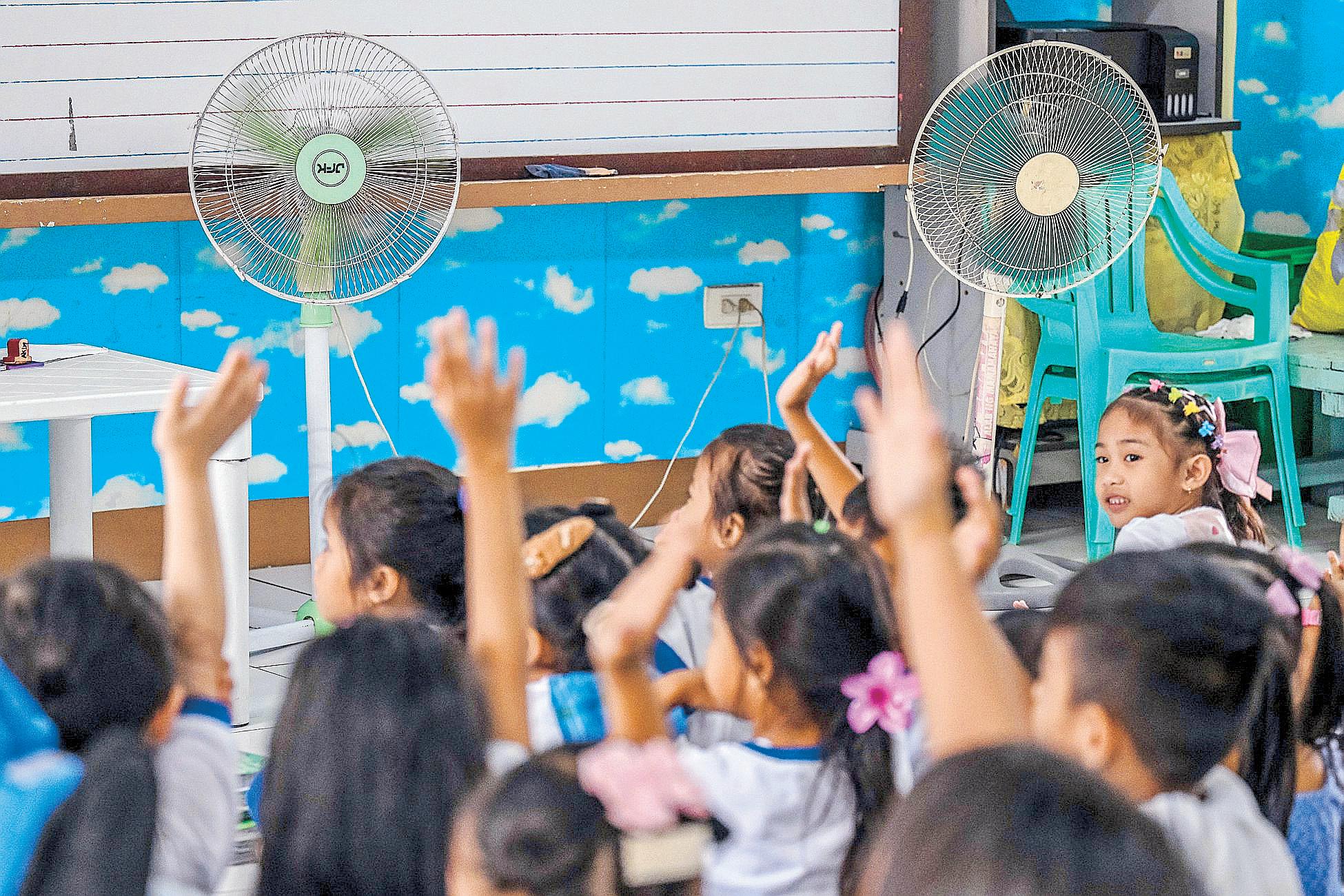 Early holiday, more fans: Schools adapt to climate change