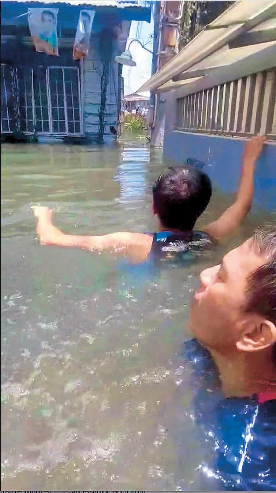 Damaged river wall causes neck-deep flooding in Navotas