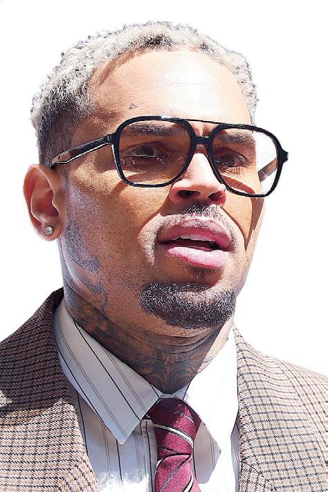Chris Brown denies more charges in UK assault case
