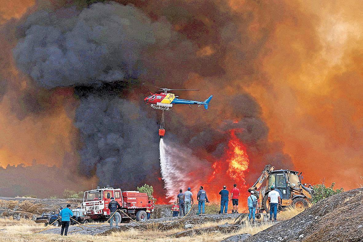 Wildfires kill 3, displace thousands across southern Europe
