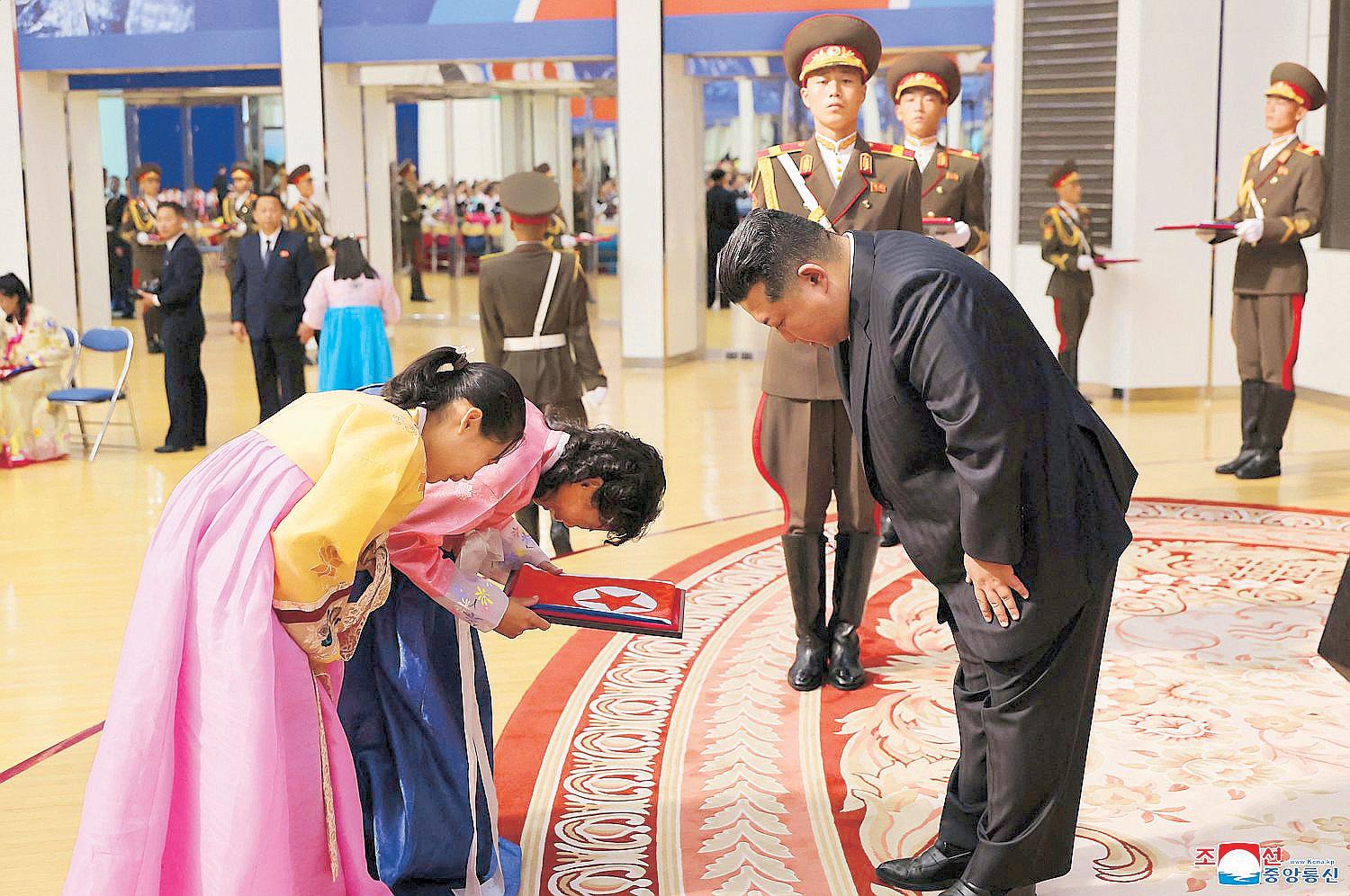 NoKor's Kim consoles families of troops killed fighting for Russia