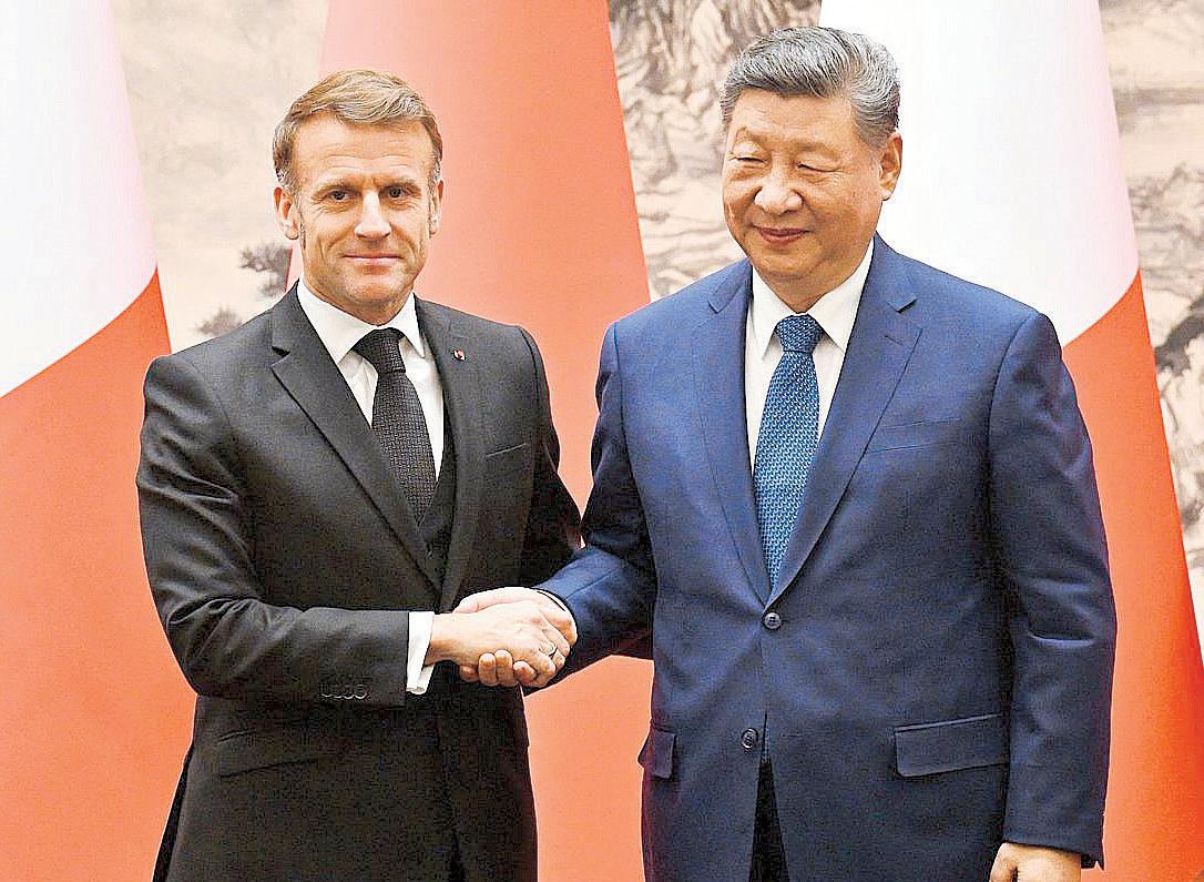 Macron urges China to work for peace, rebalance trade