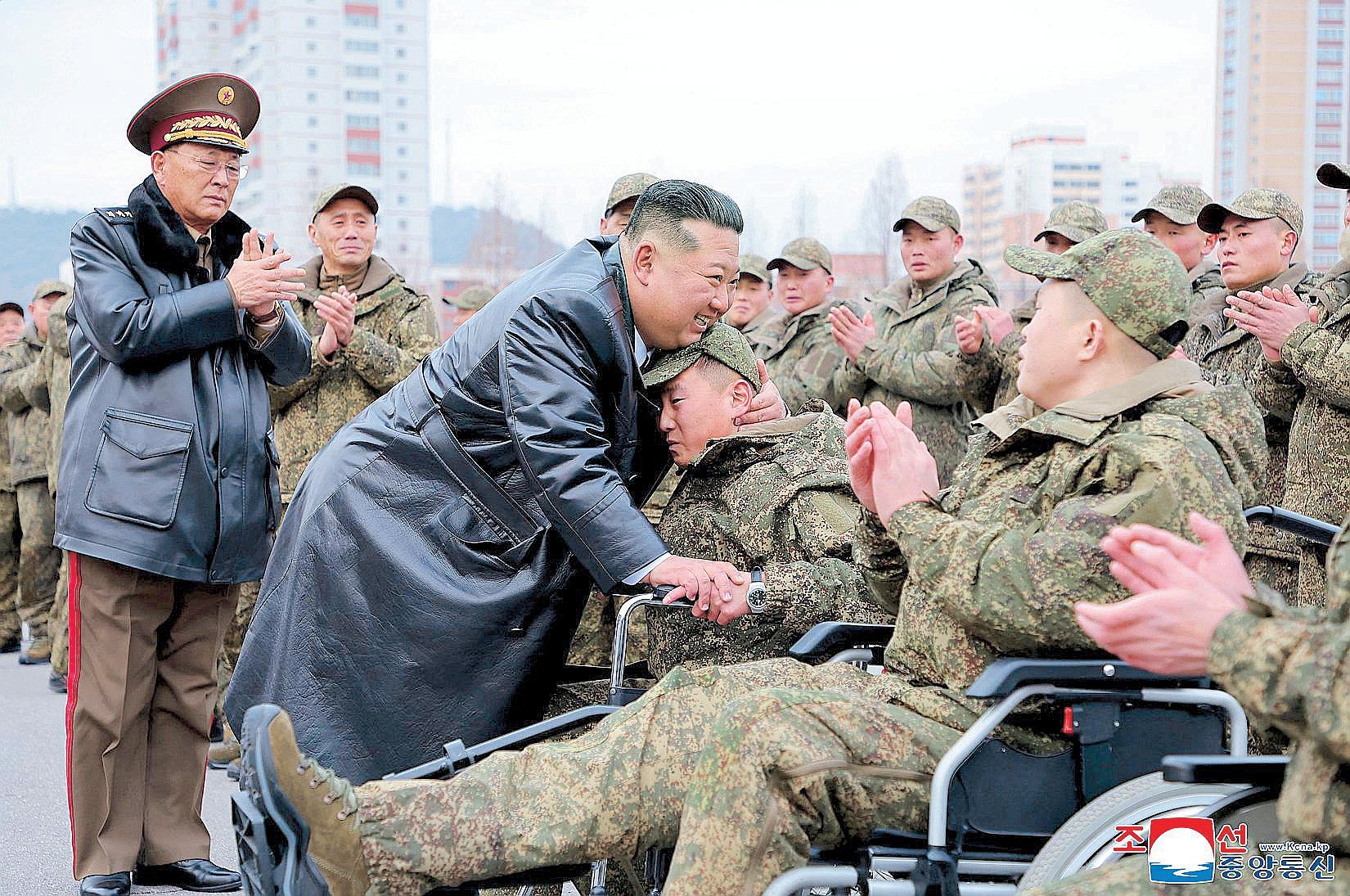NoKor's Kim hails troops returning from Russia mission