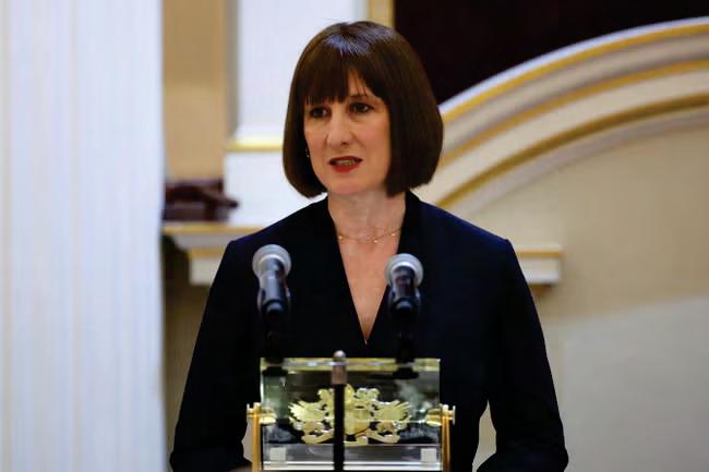 Chancellor defends flying to China amid market turmoil