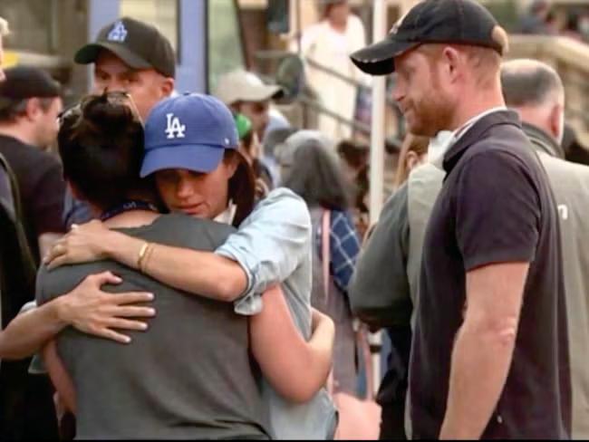 Harry and Meghan help give aid to wildfire victims