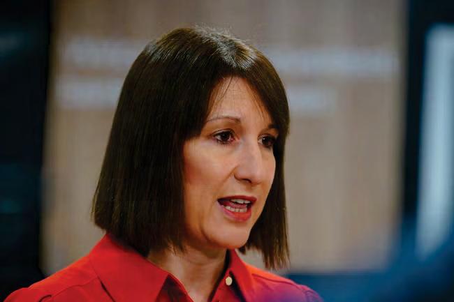 Chancellor returns from China to face business blow