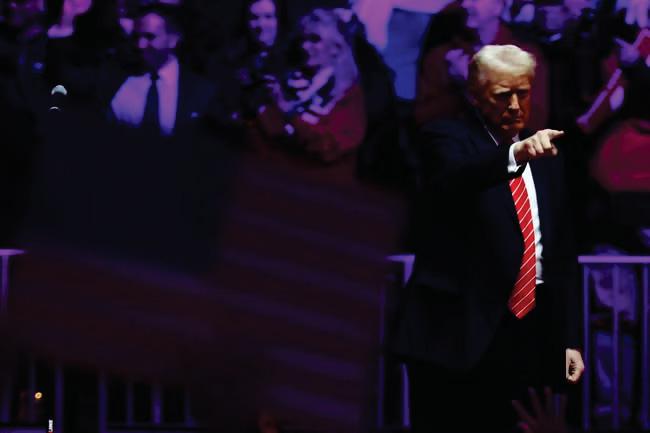 Trump starts 'two-year race' with huge star-studded rally