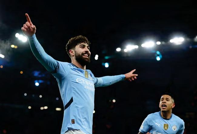Victory keeps City's hopes alive in Champions League