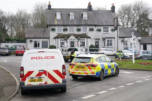 Manhunt after woman dies in shooting at village pub
