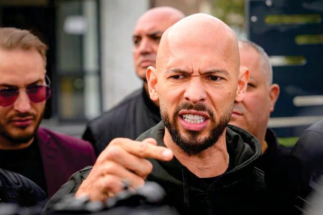 Tate 'pointed gun at woman while calling himself a boss'