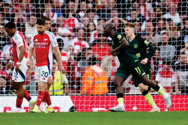 Arsenal's slim title hopes fade as Brentford hit back