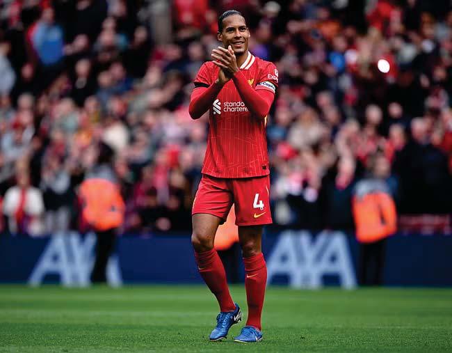 Talisman Van Dijk bags late winner as title within grasp