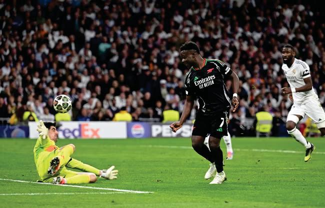 Arsenal strip champions Real for semi-final place