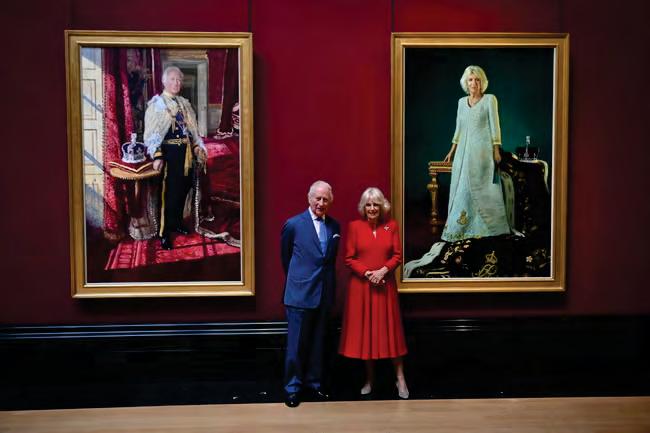 Charles and Camilla unveil state portraits of coronation