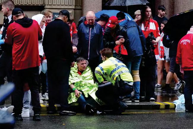 Children among dozens injured after car ploughs into Liverpool crowd