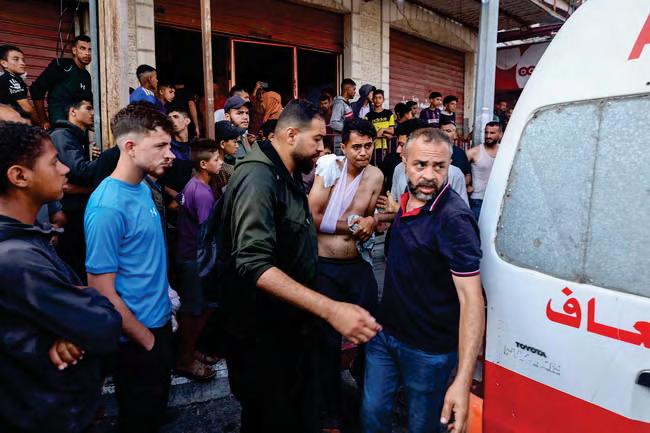 At least 31 Palestinians shot dead heading to aid centre