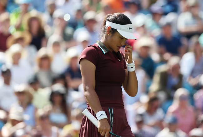 Raducanu exits Eastbourne despite spirited fightback