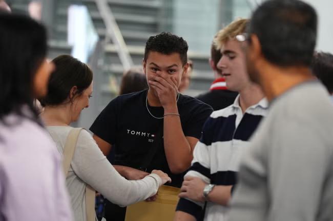 Top GCSE grades increase as boys narrow gap on girls