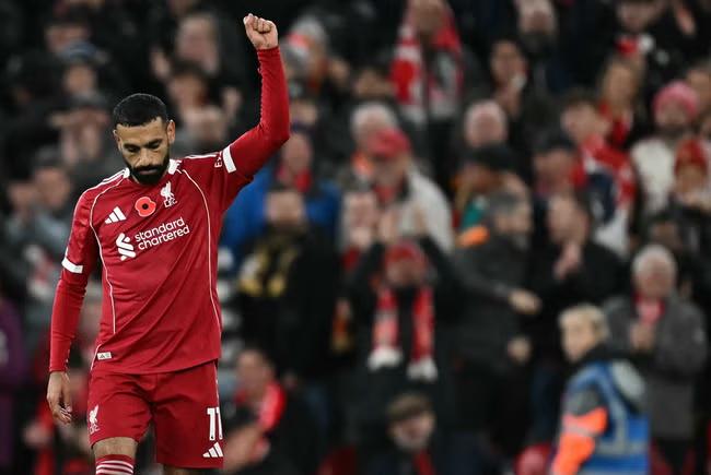Salah's 250th goal sinks Villa to send Reds third
