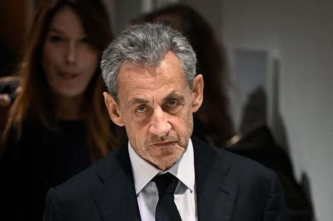 Sarkozy released from jail three weeks into sentence