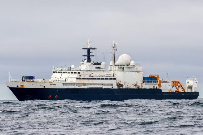 Britain takes stand against Putin over spy ship lasers