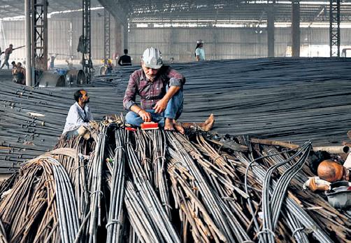 Factory output slows to 4-year low in FY25