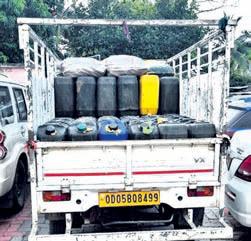 ID liquor packaged at City 'water bottling unit'; 4 held